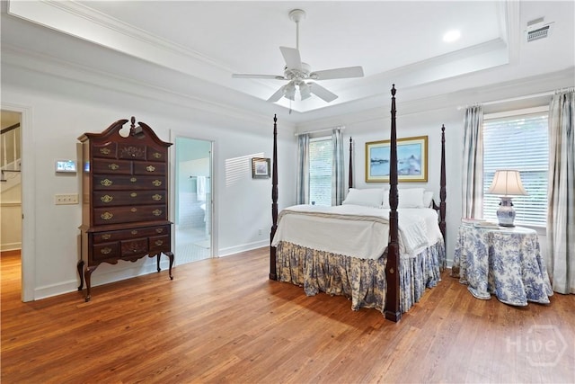 118 Woodline Dr, Savannah, GA 31410 - bedroom with a tray ceiling, wood finished floors, crown molding, baseboards, and a ceiling fan