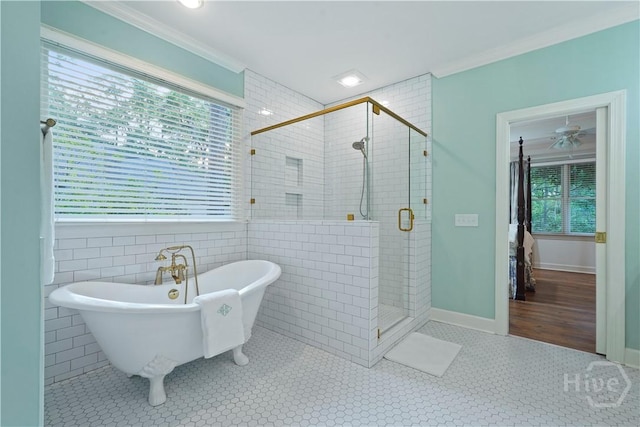 118 Woodline Dr, Savannah, GA 31410 - full bathroom featuring crown molding, a freestanding tub, a shower stall, and plenty of natural light