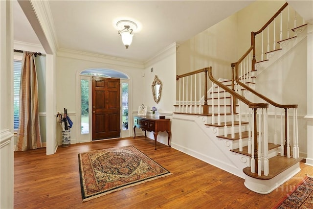 118 Woodline Dr, Savannah, GA 31410 - entryway with wood finished floors, stairs, and crown molding