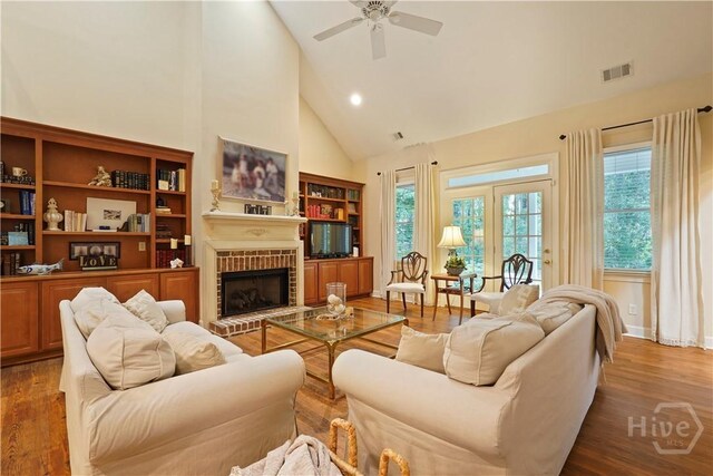 118 Woodline Dr, Savannah, GA 31410 - living room featuring high vaulted ceiling, wood finished floors, ceiling fan, and healthy amount of natural light