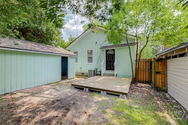 810 34th St, Savannah, GA 31401 - rear view of property featuring a wooden deck, central AC unit, and a shingled roof