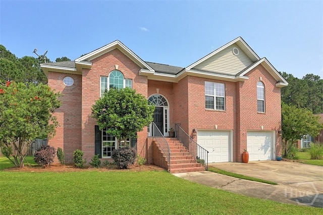 207 Pink Dogwood Ln, Pooler, GA 31322 - view of front of house with driveway, an attached garage, a front yard, and brick siding