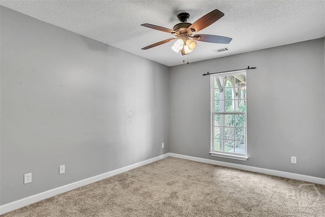 207 Pink Dogwood Ln, Pooler, GA 31322 - empty room with ceiling fan, carpet floors, baseboards, and a textured ceiling