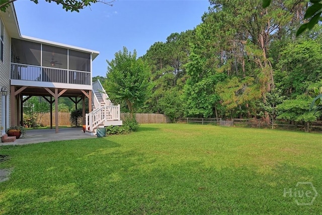 207 Pink Dogwood Ln, Pooler, GA 31322 - view of yard featuring a sunroom, a patio, stairway, and a carport