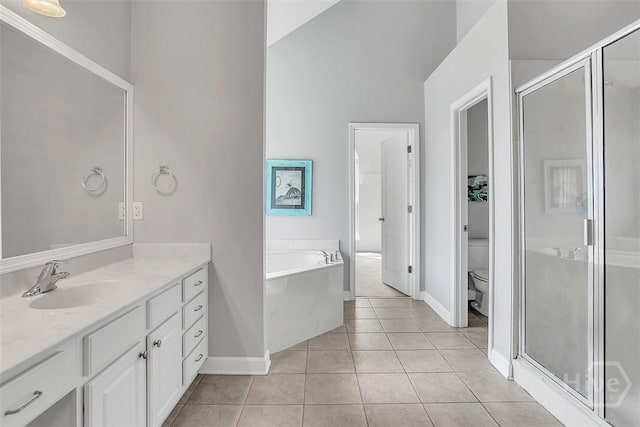207 Pink Dogwood Ln, Pooler, GA 31322 - full bath featuring vanity, baseboards, a stall shower, and a garden tub