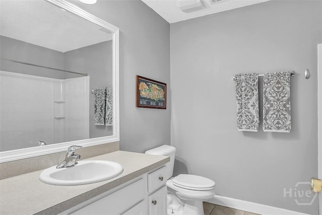 207 Pink Dogwood Ln, Pooler, GA 31322 - bathroom with vanity, tile patterned flooring, toilet, and a shower