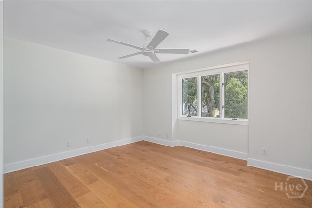 6 Schroeder Ct, Savannah, GA 31411 - unfurnished room with baseboards, light wood-style flooring, and a ceiling fan