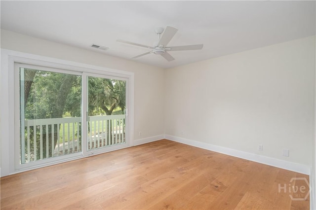 6 Schroeder Ct, Savannah, GA 31411 - unfurnished room with light wood-style flooring, baseboards, and a ceiling fan