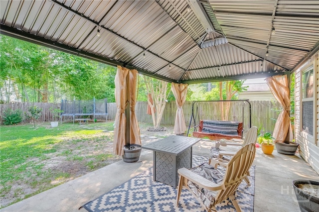 92 Shady Hill Cir, Richmond Hill, GA 31324 - view of patio featuring a trampoline and a gazebo