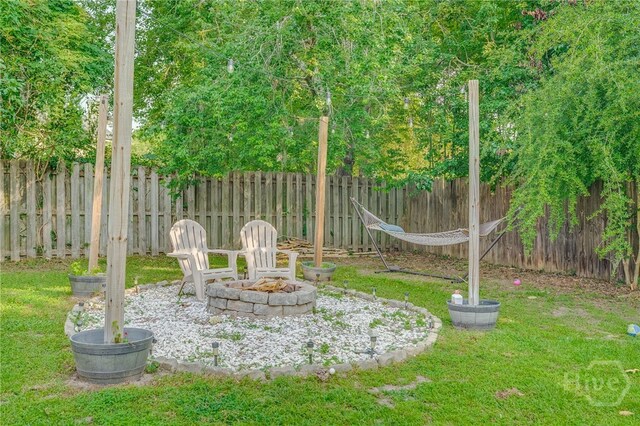 92 Shady Hill Cir, Richmond Hill, GA 31324 - view of yard featuring a fire pit