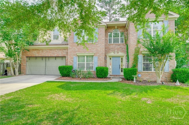 92 Shady Hill Cir, Richmond Hill, GA 31324 - view of front of property with concrete driveway, a front lawn, an attached garage, and brick siding