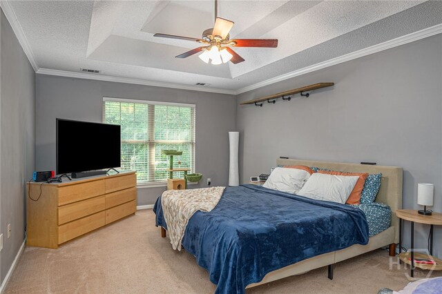 92 Shady Hill Cir, Richmond Hill, GA 31324 - bedroom featuring light colored carpet, crown molding, a tray ceiling, ceiling fan, and a textured ceiling