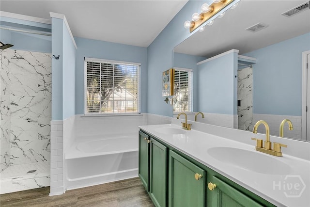 2 Timber Crest Ct, Savannah, GA 31407 - bathroom featuring a garden tub, double vanity, wood finished floors, and a marble finish shower