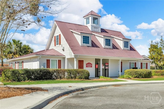 2 Timber Crest Ct, Savannah, GA 31407 - view of front of home featuring metal roof and covered porch