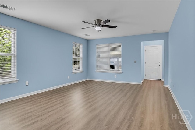 2 Timber Crest Ct, Savannah, GA 31407 - spare room featuring wood finished floors, healthy amount of natural light, ceiling fan, and baseboards
