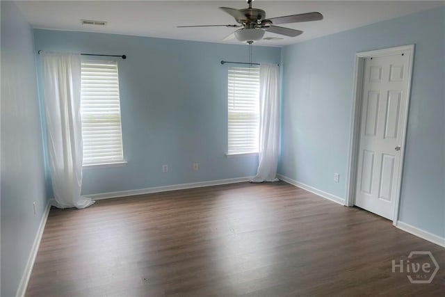 2 Timber Crest Ct, Savannah, GA 31407 - spare room featuring a ceiling fan, dark wood-style flooring, and baseboards