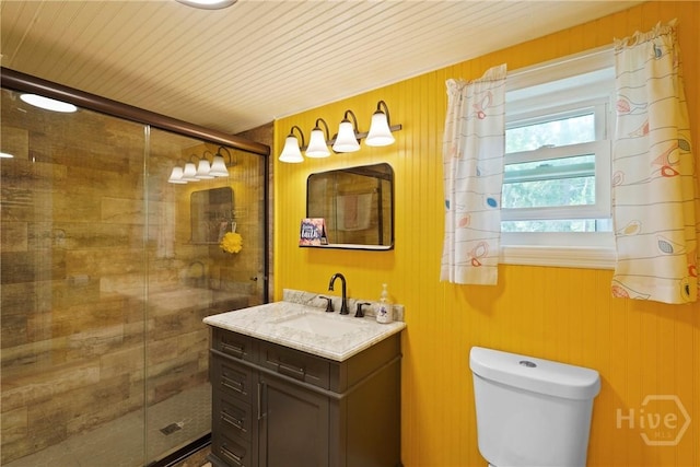 26 Arthur Cir, Savannah, GA 31406 - bathroom with vanity, a shower stall, toilet, and wood walls