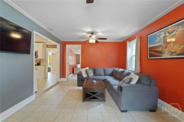 26 Arthur Cir, Savannah, GA 31406 - living area featuring ceiling fan, ornamental molding, light tile patterned floors, baseboards, and wooden walls