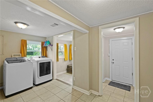 26 Arthur Cir, Savannah, GA 31406 - washroom featuring independent washer and dryer, a textured ceiling, light tile patterned floors, crown molding, and baseboards