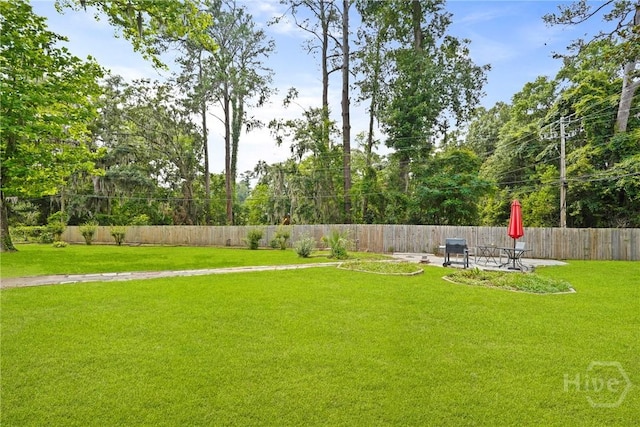 26 Arthur Cir, Savannah, GA 31406 - view of yard with a patio area