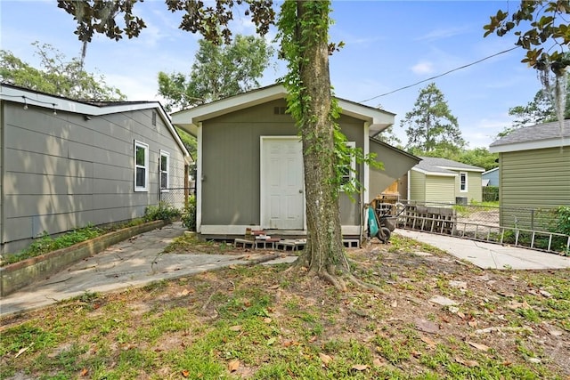 26 Arthur Cir, Savannah, GA 31406 - back of property with an outbuilding and a patio area