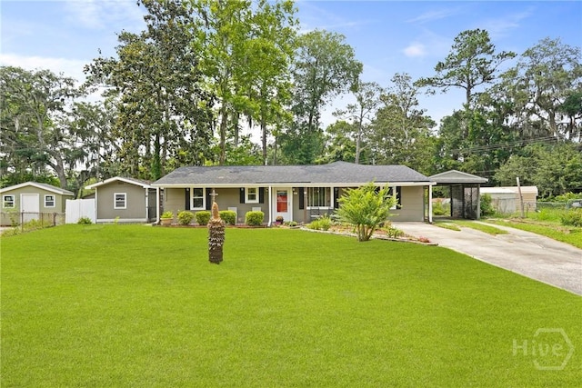 26 Arthur Cir, Savannah, GA 31406 - ranch-style home with concrete driveway and a carport