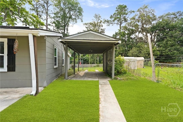 26 Arthur Cir, Savannah, GA 31406 - view of vehicle parking with a carport