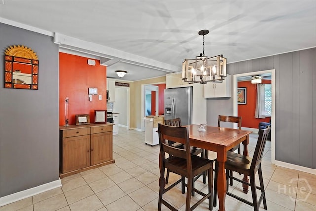 26 Arthur Cir, Savannah, GA 31406 - dining space featuring a chandelier, baseboards, and light tile patterned floors