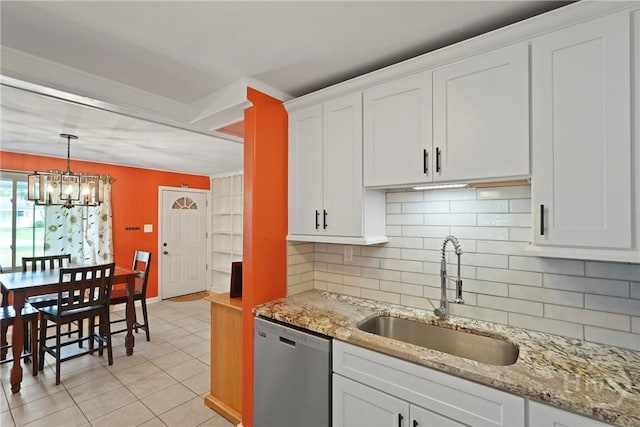 26 Arthur Cir, Savannah, GA 31406 - kitchen featuring dishwasher, a sink, a chandelier, decorative backsplash, and white cabinetry