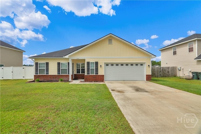673 Burke Dr, Hinesville, GA 31313 - ranch-style house featuring brick siding, a gate, an attached garage, and concrete driveway