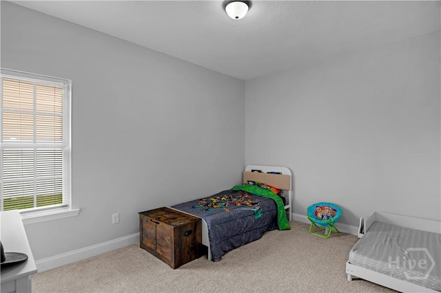 673 Burke Dr, Hinesville, GA 31313 - bedroom featuring carpet flooring and baseboards