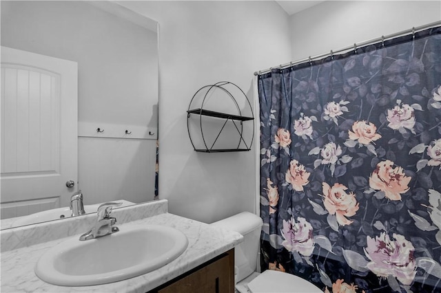 673 Burke Dr, Hinesville, GA 31313 - bathroom featuring vanity, toilet, and a shower with curtain