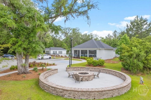 303 Waybridge Way, Richmond Hill, GA 31324 - view of property's community featuring a fire pit and a yard