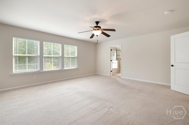 303 Waybridge Way, Richmond Hill, GA 31324 - unfurnished room with a ceiling fan, light colored carpet, baseboards, and a smoke detector