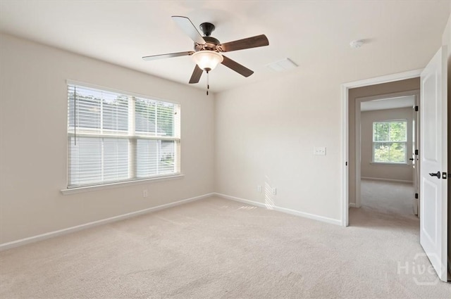303 Waybridge Way, Richmond Hill, GA 31324 - unfurnished room featuring light carpet, baseboards, and ceiling fan