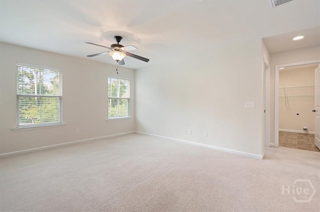 303 Waybridge Way, Richmond Hill, GA 31324 - empty room featuring light colored carpet, baseboards, ceiling fan, and recessed lighting