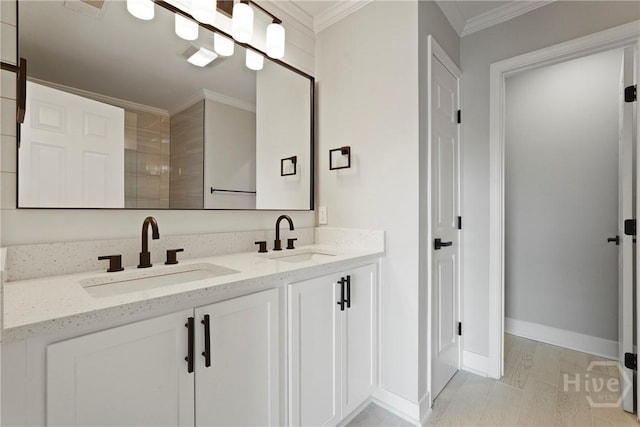 570 Canyon Oak Loop, Richmond Hill, GA 31324 - bathroom featuring double vanity, crown molding, and baseboards