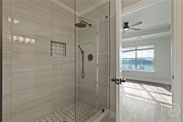 570 Canyon Oak Loop, Richmond Hill, GA 31324 - bathroom featuring crown molding, a shower stall, baseboards, and ceiling fan