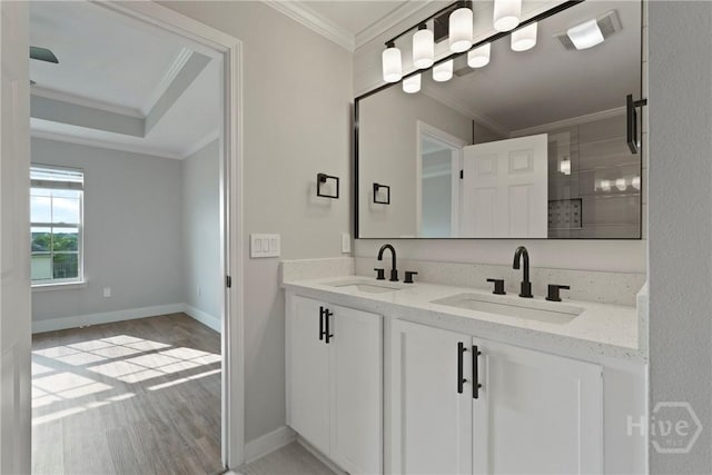 570 Canyon Oak Loop, Richmond Hill, GA 31324 - full bath featuring double vanity, ornamental molding, wood finished floors, and baseboards