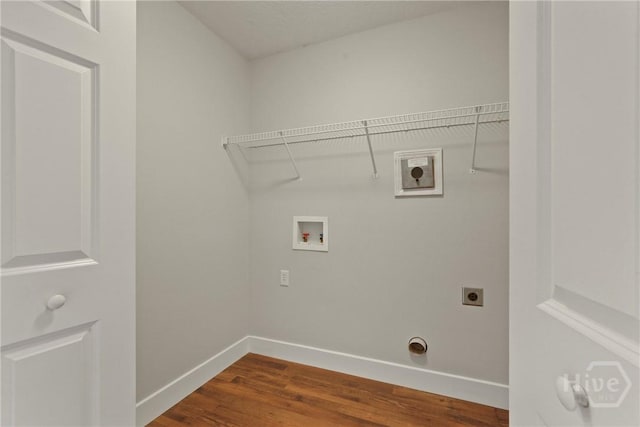 570 Canyon Oak Loop, Richmond Hill, GA 31324 - laundry room featuring hookup for an electric dryer, washer hookup, baseboards, and dark wood-style flooring