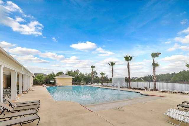 570 Canyon Oak Loop, Richmond Hill, GA 31324 - community pool featuring a patio