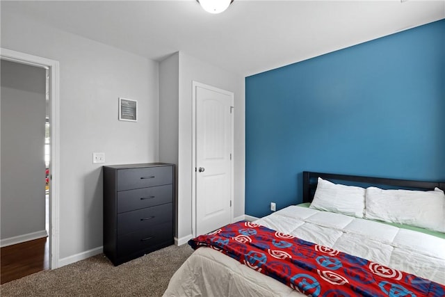 244 Murray Crossing Blvd NE, Ludowici, GA 31316 - bedroom with baseboards and carpet floors
