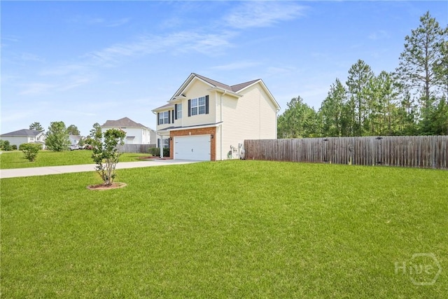 244 Murray Crossing Blvd NE, Ludowici, GA 31316 - view of front facade with driveway and a garage