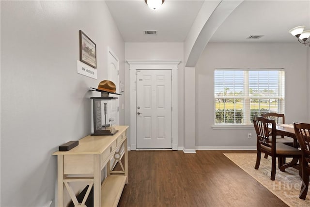 244 Murray Crossing Blvd NE, Ludowici, GA 31316 - entryway with dark wood-style floors, baseboards, and arched walkways