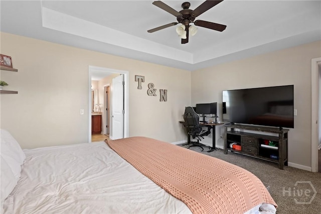 244 Murray Crossing Blvd NE, Ludowici, GA 31316 - bedroom featuring carpet, a raised ceiling, baseboards, and ceiling fan