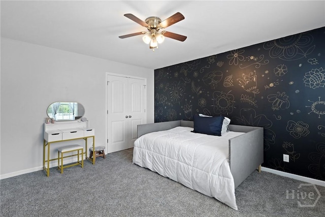 244 Murray Crossing Blvd NE, Ludowici, GA 31316 - carpeted bedroom featuring a closet, ceiling fan, and baseboards