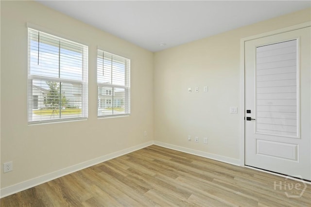112 Mage St, Savannah, GA 31302 - empty room with light wood-style flooring and baseboards