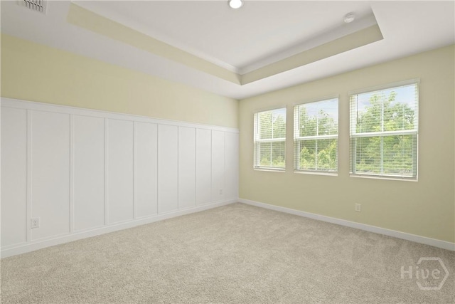 112 Mage St, Savannah, GA 31302 - empty room featuring carpet flooring, a tray ceiling, and a smoke detector