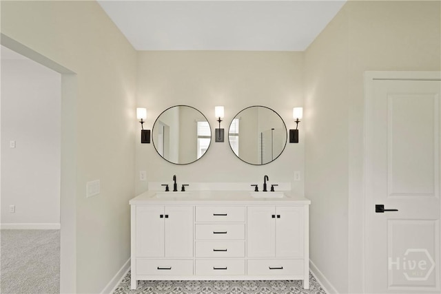 112 Mage St, Savannah, GA 31302 - bathroom featuring double vanity and baseboards