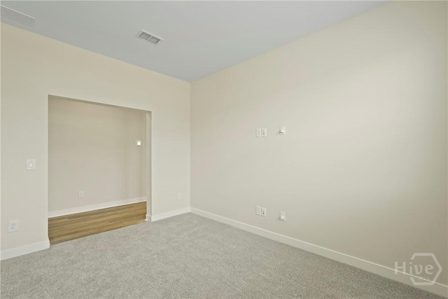 112 Mage St, Savannah, GA 31302 - carpeted spare room with baseboards